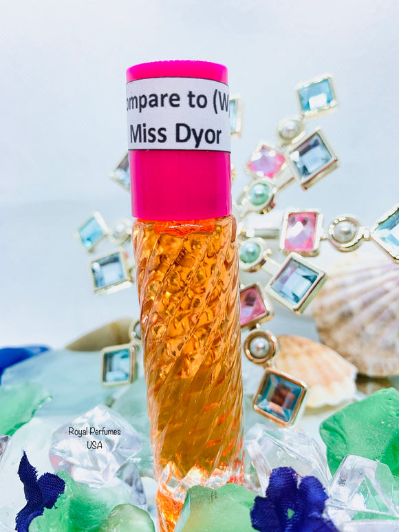 a bottle of fragrance body oil named Miss Dior