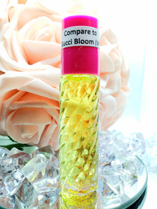 a bottle of Gucci Bloom type body perfume oil.