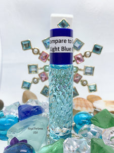 a bottle of Light Blue Dolce and Gabbana type perfume body oil